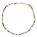 Single row gemstone necklace including pink tourmaline, green tourmaline and brown tourmaline with 18ct gold sections and hook clasp.