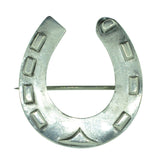 silver horse shoe brooch