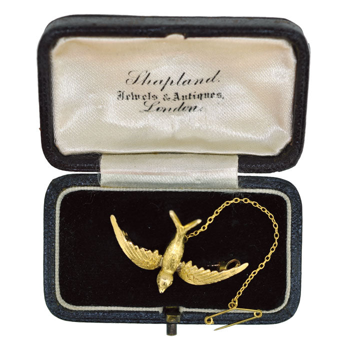 antique bird brooch